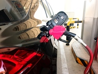 A vehicle fills up at a gas station in the Haidian district in Beijing, China, on October 9, 2024. (