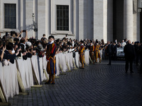 Pope Francis waves to the crowd from the popemobile as he arrives for the weekly general audience at St. Peter's Square in The Vatican on Oc...