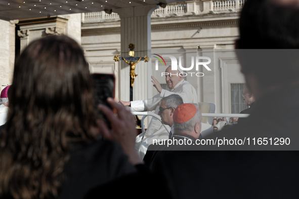 Pope Francis leads the weekly general audience in Saint Peter's Square in Vatican City on October 9, 2024. 