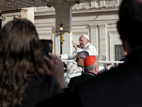 Pope Francis leads the weekly general audience in Saint Peter's Square in Vatican City on October 9, 2024. (