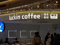 Customers shop at Luckin Coffee x Tea Mix store in Shanghai, China, on October 9, 2024. (