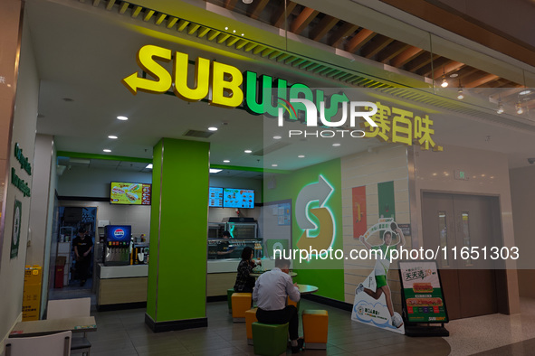 Customers shop at a SUBWAY store in Shanghai, China, on October 9, 2024. 