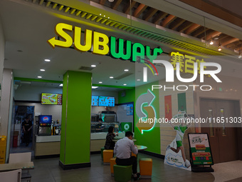 Customers shop at a SUBWAY store in Shanghai, China, on October 9, 2024. (