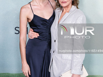 Charlotte Lawrence and mother Christa Miller arrive at the World Premiere Of Apple TV+ Series' 'Shrinking' Season 2 held at the Pacific Desi...