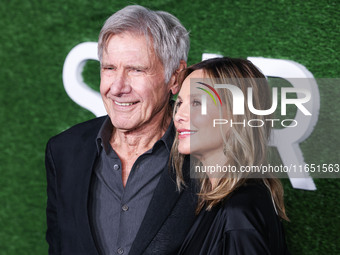 Harrison Ford and wife Calista Flockhart arrive at the World Premiere Of Apple TV+ Series' 'Shrinking' Season 2 held at the Pacific Design C...