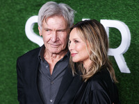 Harrison Ford and wife Calista Flockhart arrive at the World Premiere Of Apple TV+ Series' 'Shrinking' Season 2 held at the Pacific Design C...