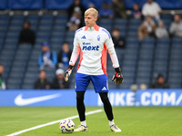 Aaron Bott of Nottingham Forest warms up ahead of kick-off during the Premier League match between Chelsea and Nottingham Forest at Stamford...