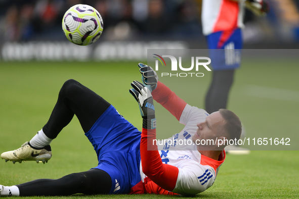 Matz Sels, Nottingham Forest goalkeeper, warms up ahead of kick-off during the Premier League match between Chelsea and Nottingham Forest at...