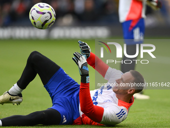 Matz Sels, Nottingham Forest goalkeeper, warms up ahead of kick-off during the Premier League match between Chelsea and Nottingham Forest at...