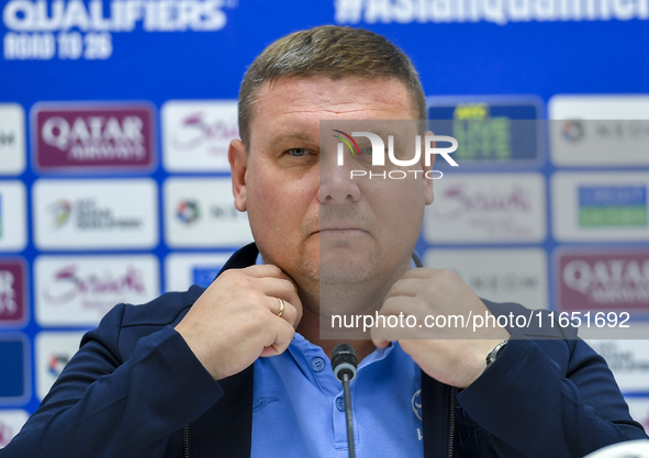 Kyrgyzstan National team Head Coach Maksim Lisitsyn attends a press conference at Al Thumama Stadium in Doha, Qatar, on October 9, 2024, ahe...