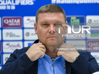 Kyrgyzstan National team Head Coach Maksim Lisitsyn attends a press conference at Al Thumama Stadium in Doha, Qatar, on October 9, 2024, ahe...