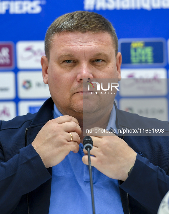 Kyrgyzstan National team Head Coach Maksim Lisitsyn attends a press conference at Al Thumama Stadium in Doha, Qatar, on October 9, 2024, ahe...