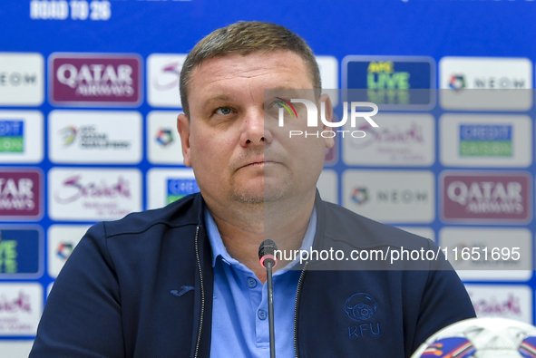 Kyrgyzstan National team Head Coach Maksim Lisitsyn attends a press conference at Al Thumama Stadium in Doha, Qatar, on October 9, 2024, ahe...