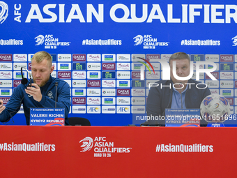 Kyrgyzstan National team Head Coach Maksim Lisitsyn and player Valerii Kichin attend a press conference at Al Thumama Stadium in Doha, Qatar...