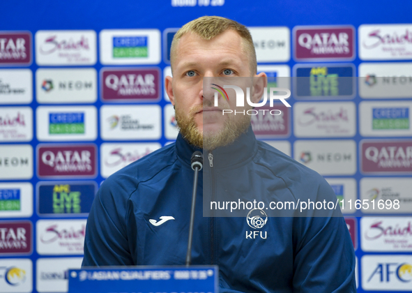 Kyrgyzstan National team player Valerii Kichin attends a press conference at Al Thumama Stadium in Doha, Qatar, on October 9, 2024, ahead of...