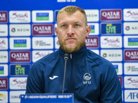 Kyrgyzstan National team player Valerii Kichin attends a press conference at Al Thumama Stadium in Doha, Qatar, on October 9, 2024, ahead of...