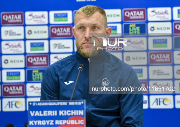 Kyrgyzstan National team player Valerii Kichin attends a press conference at Al Thumama Stadium in Doha, Qatar, on October 9, 2024, ahead of...