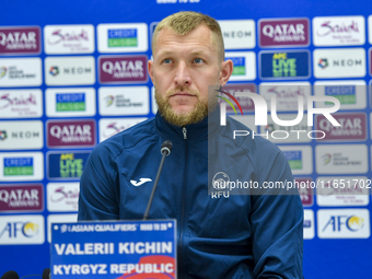 Kyrgyzstan National team player Valerii Kichin attends a press conference at Al Thumama Stadium in Doha, Qatar, on October 9, 2024, ahead of...