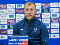 Kyrgyzstan National team player Valerii Kichin attends a press conference at Al Thumama Stadium in Doha, Qatar, on October 9, 2024, ahead of...