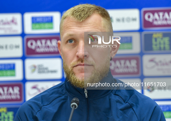 Kyrgyzstan National team player Valerii Kichin attends a press conference at Al Thumama Stadium in Doha, Qatar, on October 9, 2024, ahead of...