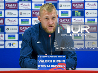 Kyrgyzstan National team player Valerii Kichin attends a press conference at Al Thumama Stadium in Doha, Qatar, on October 9, 2024, ahead of...