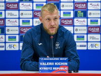 Kyrgyzstan National team player Valerii Kichin attends a press conference at Al Thumama Stadium in Doha, Qatar, on October 9, 2024, ahead of...