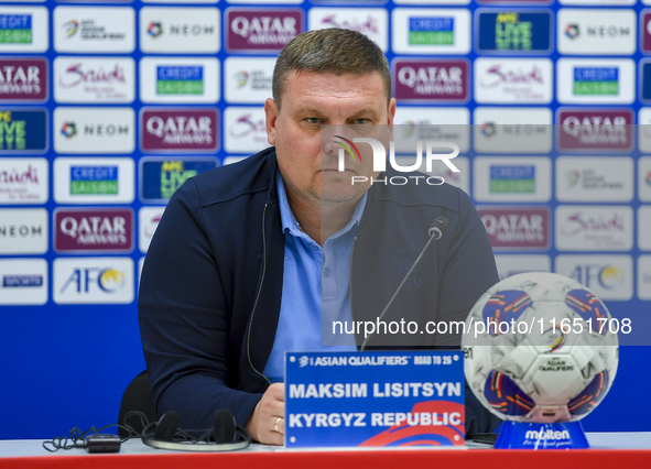 Kyrgyzstan National team Head Coach Maksim Lisitsyn attends a press conference at Al Thumama Stadium in Doha, Qatar, on October 9, 2024, ahe...