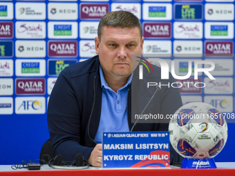 Kyrgyzstan National team Head Coach Maksim Lisitsyn attends a press conference at Al Thumama Stadium in Doha, Qatar, on October 9, 2024, ahe...