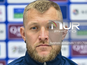 Kyrgyzstan National team player Valerii Kichin attends a press conference at Al Thumama Stadium in Doha, Qatar, on October 9, 2024, ahead of...