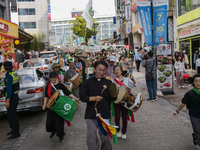 Hundreds of Catholic priests, nuns, and members of the Catholic Climate Action group march in central Seoul, starting from Myeongdong Cathed...