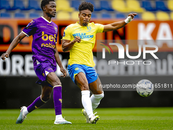 Go Ahead Eagles player Jamal Amofa and RKC player Godfried Roemeratoe participate in the friendly match between RKC and Go Ahead Eagles at t...