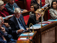 Nathalie Delattre, Minister attached to the Prime Minister, responsible for Relations with Parliament, sits in the front row of the governme...