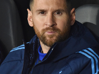 Lionel Messi of Argentina sits on the bench before a World Cup Qualifiers match between Argentina and Paraguay at Estadio Mas Monumental Ant...