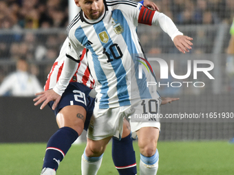 Lionel Messi of Argentina participates in a World Cup Qualifiers match between Argentina and Paraguay at Estadio Mas Monumental Antonio Vesp...