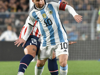 Lionel Messi of Argentina participates in a World Cup Qualifiers match between Argentina and Paraguay at Estadio Mas Monumental Antonio Vesp...