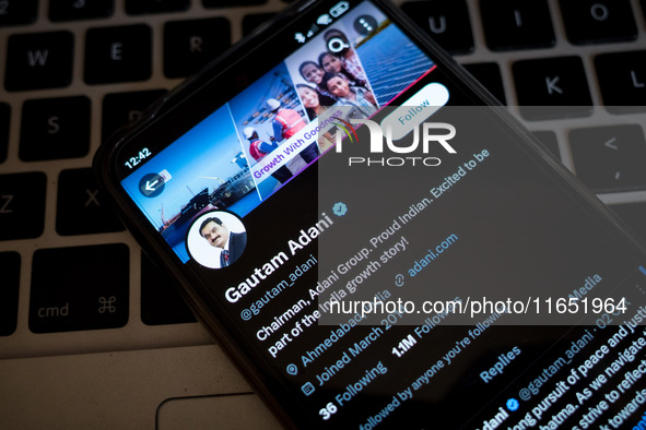 The Twitter (X) profile of Gautam Adani displays on a smartphone screen in Athens, Greece, on October 9, 2024. (Photo Illustration by Nikola...