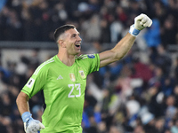 Emiliano Martinez of Argentina celebrates his team's goal in a World Cup Qualifiers match between Argentina and Ecuador at Estadio Mas Monum...