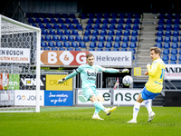 Go Ahead Eagles goalkeeper Jari de Busse and RKC player Reuven Niemeijer participate in the friendly match between RKC and Go Ahead Eagles a...