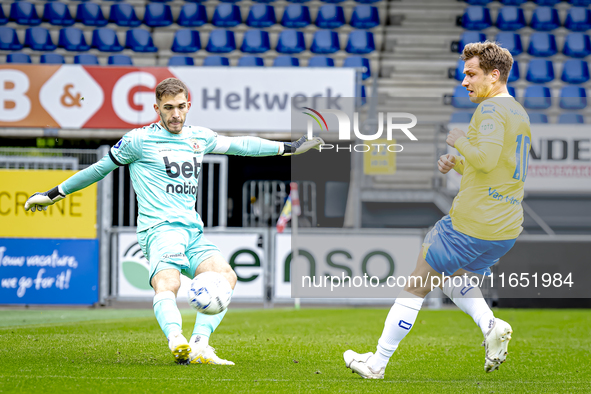 Go Ahead Eagles goalkeeper Jari de Busse and RKC player Reuven Niemeijer participate in the friendly match between RKC and Go Ahead Eagles a...