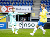 Go Ahead Eagles goalkeeper Jari de Busse and RKC player Reuven Niemeijer participate in the friendly match between RKC and Go Ahead Eagles a...