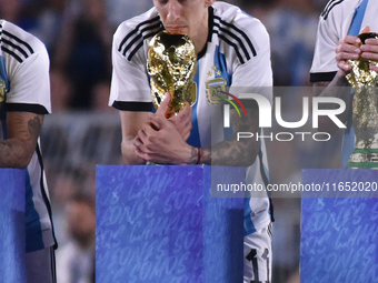 Angel Di Maria celebrates the World Champions title after an International Friendly match between Argentina and Panama at Estadio Mas Monume...