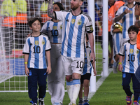 Lionel Messi and his teammates celebrate the World Champions title after an International Friendly match between Argentina and Panama at Est...