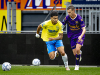 RKC player Richonell Margaret and Go Ahead Eagles player Pim Saathof participate in the friendly match between RKC and Go Ahead Eagles at th...