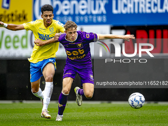 RKC player Richonell Margaret and Go Ahead Eagles player Pim Saathof participate in the friendly match between RKC and Go Ahead Eagles at th...