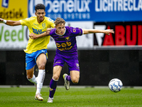 RKC player Richonell Margaret and Go Ahead Eagles player Pim Saathof participate in the friendly match between RKC and Go Ahead Eagles at th...