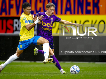 RKC player Richonell Margaret and Go Ahead Eagles player Pim Saathof participate in the friendly match between RKC and Go Ahead Eagles at th...