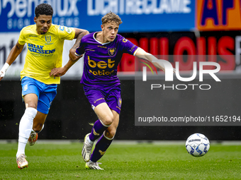 RKC player Richonell Margaret and Go Ahead Eagles player Pim Saathof participate in the friendly match between RKC and Go Ahead Eagles at th...