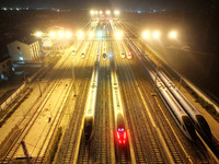 Bullet trains wait for departure at a domestic depot in Lianyungang, China, on October 9, 2024. (