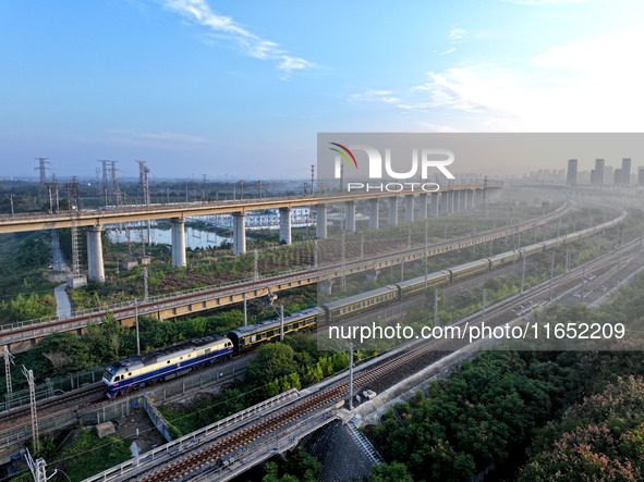 A bullet train runs in Lianyungang, China, on October 9, 2024. 