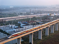 A bullet train runs in Lianyungang, China, on October 9, 2024. (